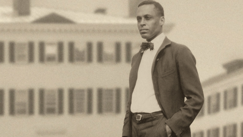 Ernest Everett Just standing in front of a campus building